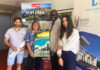 Beatrix Loizon Présidente de "Doubs Tourisme" et d'autres personnes tenant une affiche