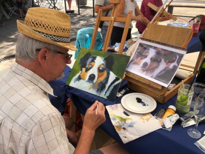 un artiste lors la Place aux Artistes à Pontarlier
