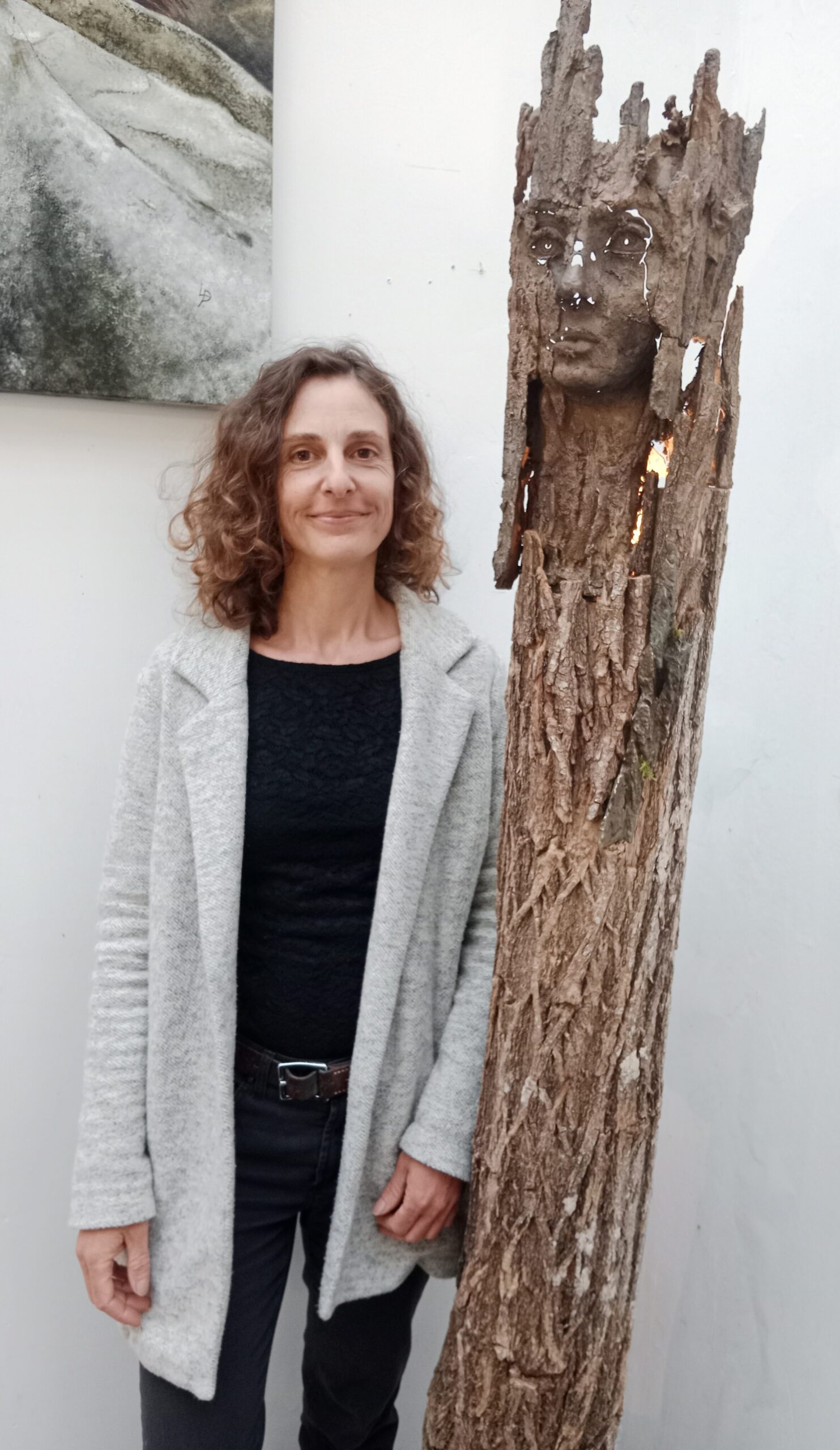 Artworks and visitors inside L’Atelier de Gustave Ornans